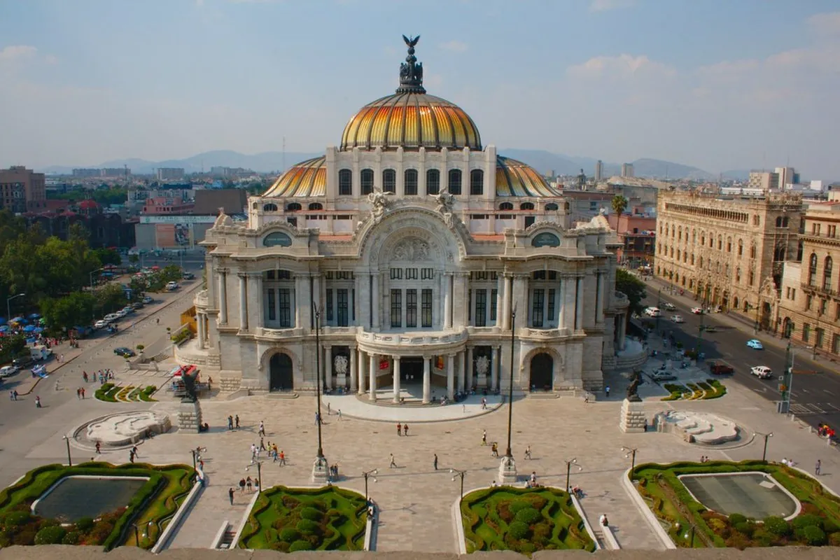 The gold-domed Palacio de Bellas Artes in Mexico City on a sunny day